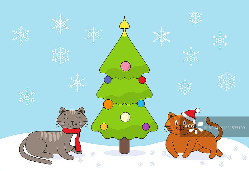 猫咪在装饰好的圣诞树旁的雪地里图片素材