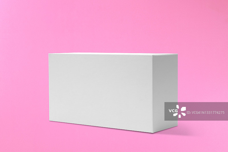 粉色背景上的空白色长方体盒子图片素材