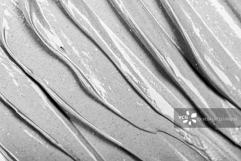 黑色黏土污迹面膜质地，美容护肤产品特写图片素材