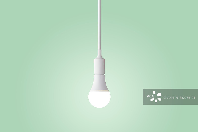绿色背景下的LED照明灯泡图片素材