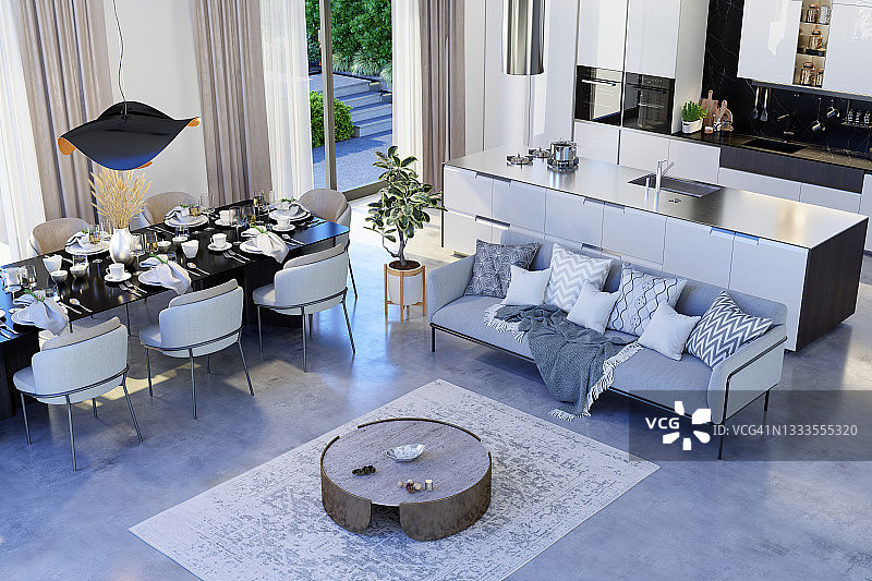豪华客厅内景：配有沙发、咖啡桌、餐桌和开放式厨房图片素材