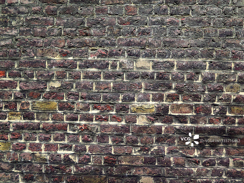 伦敦脏污且风化的砖墙图片素材