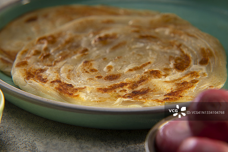 盘装印度抛饼图片素材