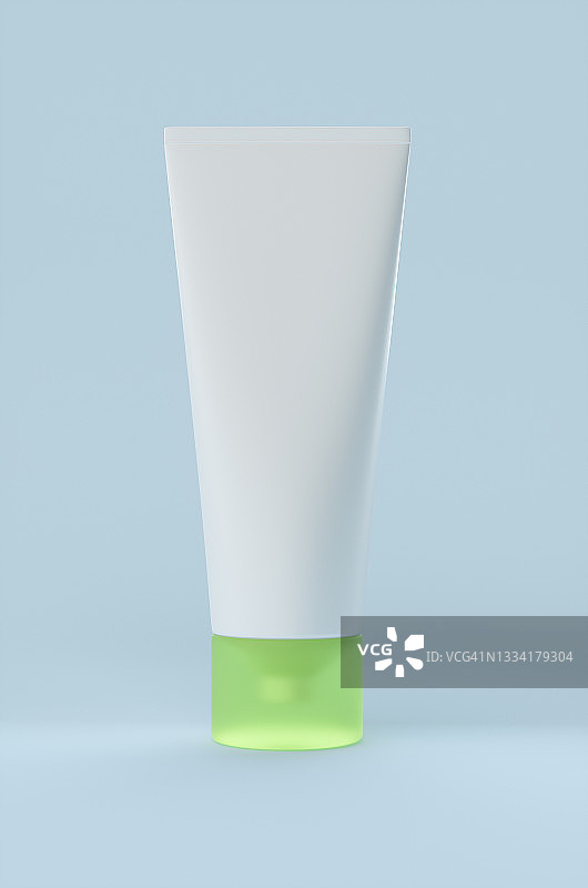 蓝色背景上的白色面膜霜管状包装图片素材