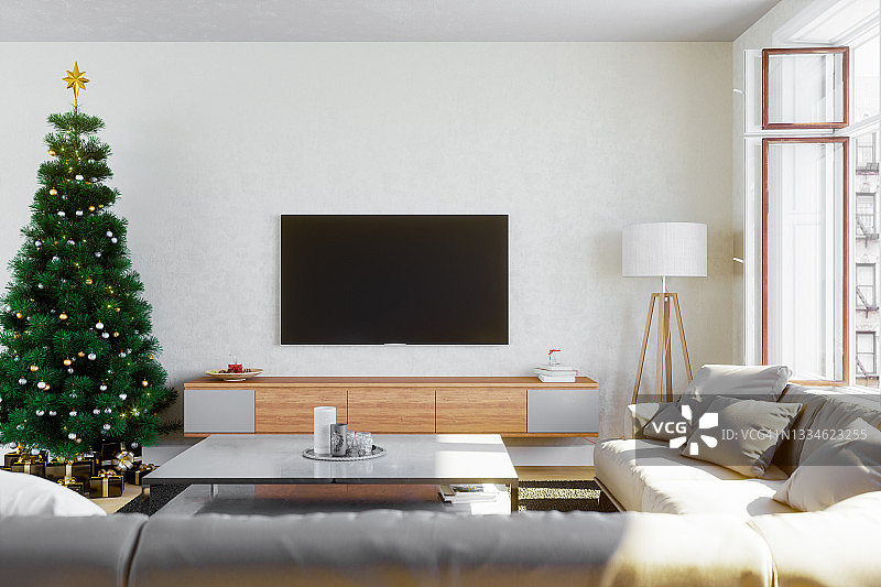 客厅里被礼物包围的圣诞树图片素材