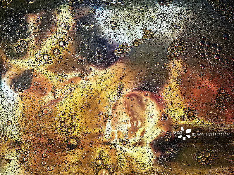 金色液体气泡和水滴纹理背景图片素材