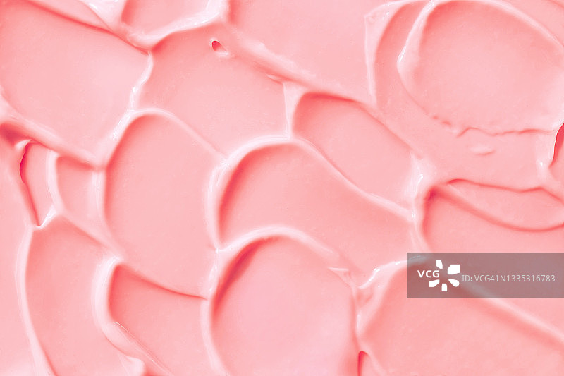 用于美容程序的奶油粉色涂抹质地。年度潮流产品。健康概念图片素材