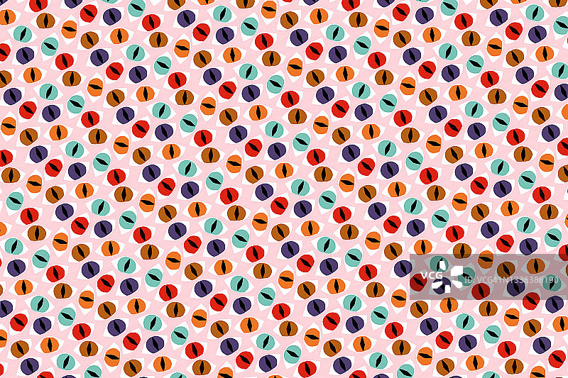 粉色背景上的万圣节恐怖猫眼图案图片素材