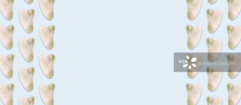 亮绿色背景上的刮痧板图片素材