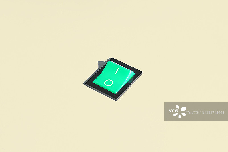 粉彩背景上的翘板开关，断电位置图片素材