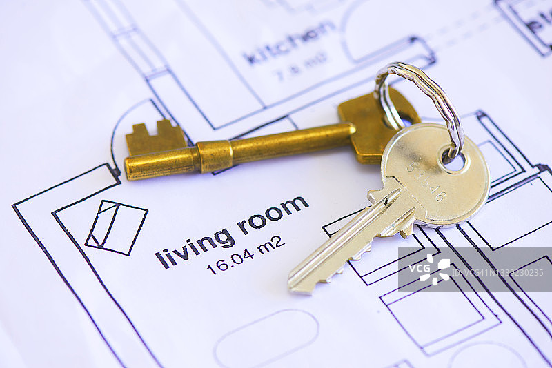 蓝图上的房屋钥匙图片素材
