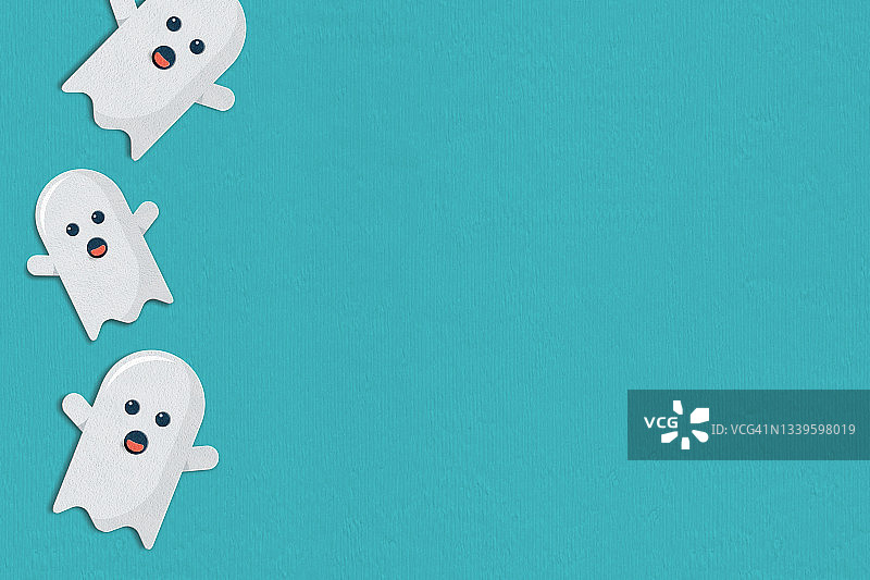 万圣节蓝色背景纸艺幽灵图片素材