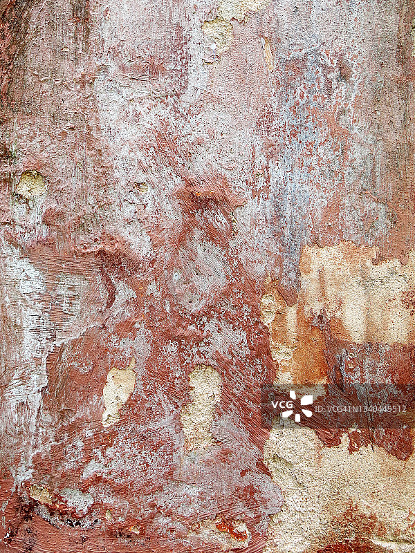 巴黎粗糙墙面上风化且有划痕的绘画图片素材