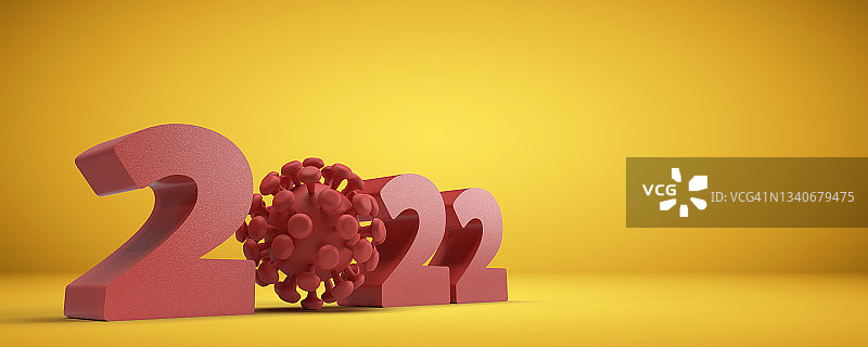 黄色背景上的2022年日历和病毒细胞图片素材