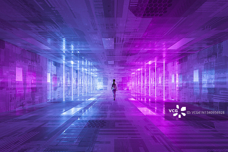 女商人在未来主义的黑暗照明走廊中行走图片素材