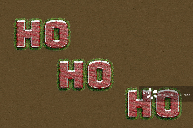 棕色毛毡背景上的HO HO HO文字图片素材