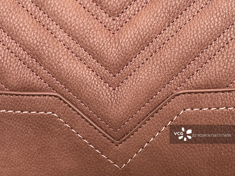 粉棕色手提包V形缝线图案图片素材