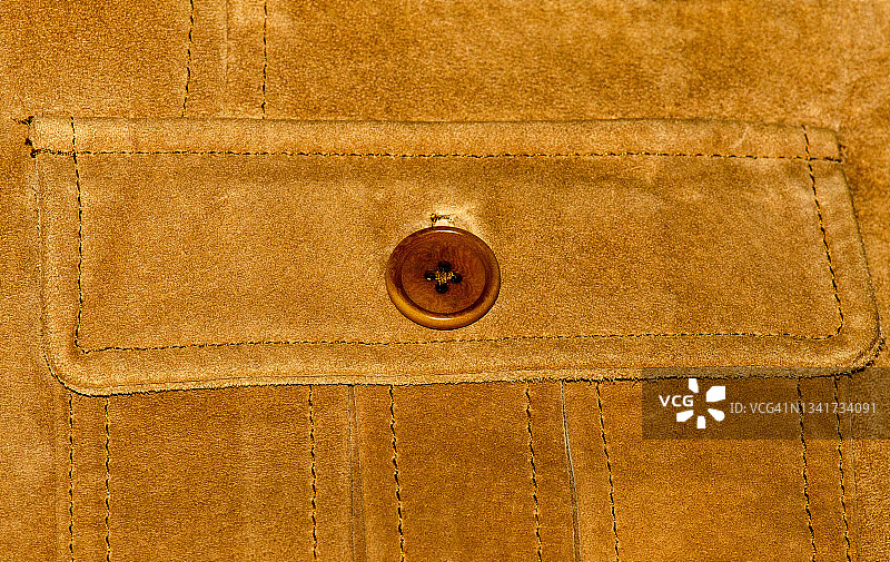 棕色绒面革皮夹克的部件和细节图片素材