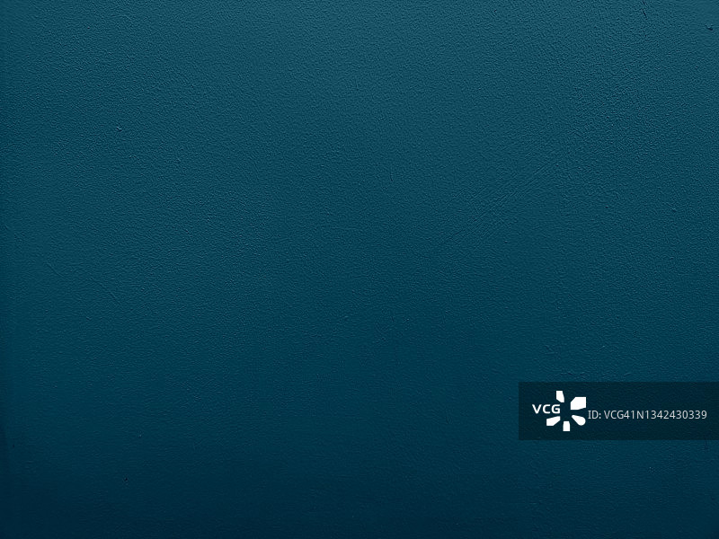 水泥墙上深蓝色油漆，混凝土纹理背景，抽象材料光滑表面图片素材