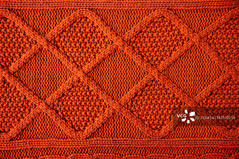 光滑针织红棕色毛衣纹理，扁平风格，特写图片素材