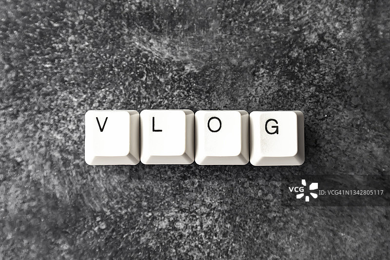电脑键盘按键拼写单词VLOG图片素材