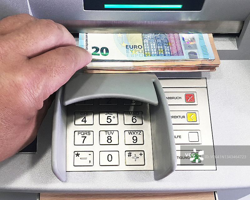 带现金的ATM机图片素材