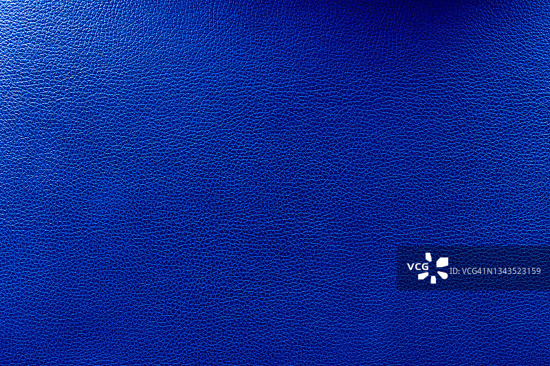 深蓝色皮革纹理背景特写图片素材