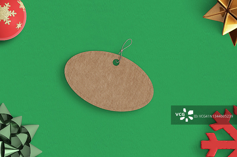 绿色背景中带有圣诞饰品的纸板回收标签图片素材