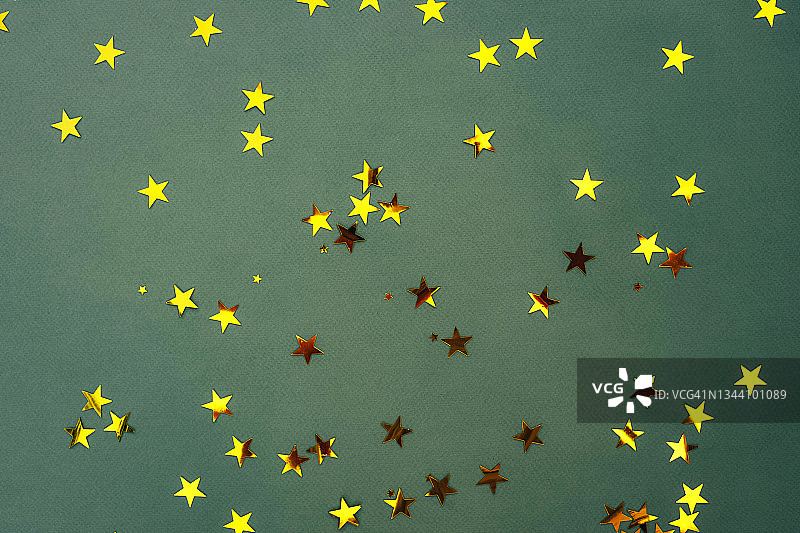 金色星星绿色背景图片素材