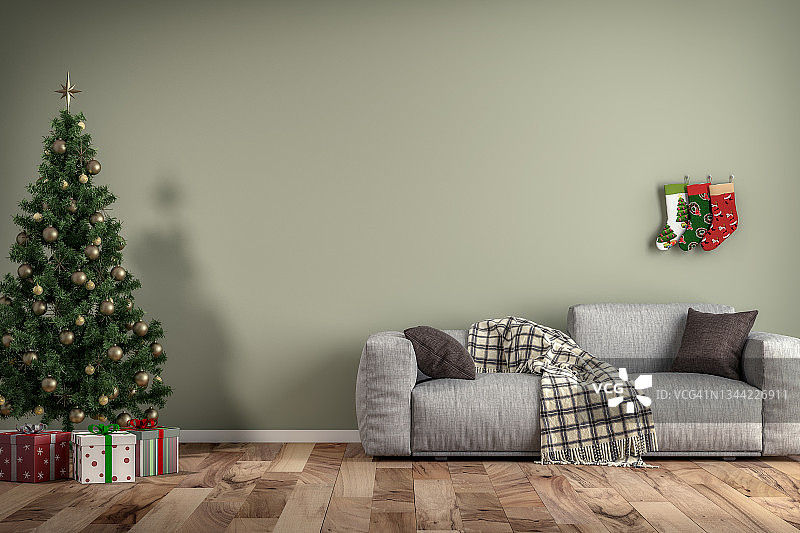 空旷的客厅，配有灰色沙发、圣诞树和礼物图片素材