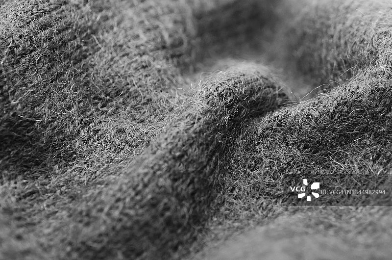 褶皱灰色毛衣特写，扁平风格图片素材