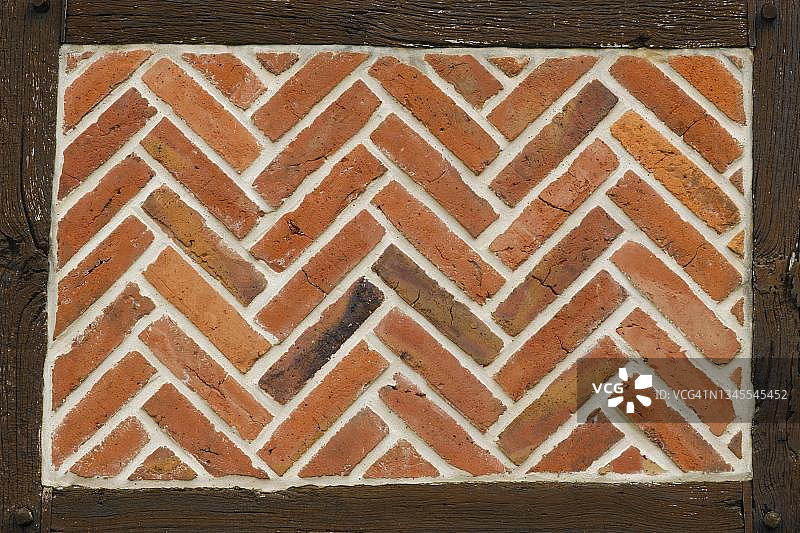 德国北莱茵-威斯特法伦州黑尔福德的半木结构砖砌外墙图片素材