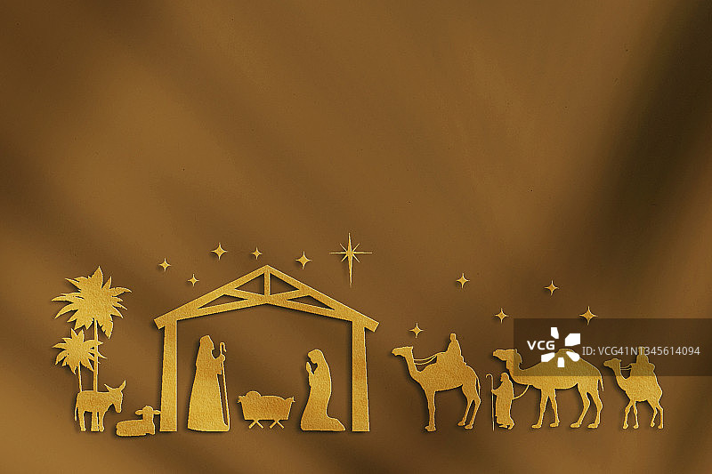 纸艺圣诞耶稣诞生场景与棕色背景图片素材