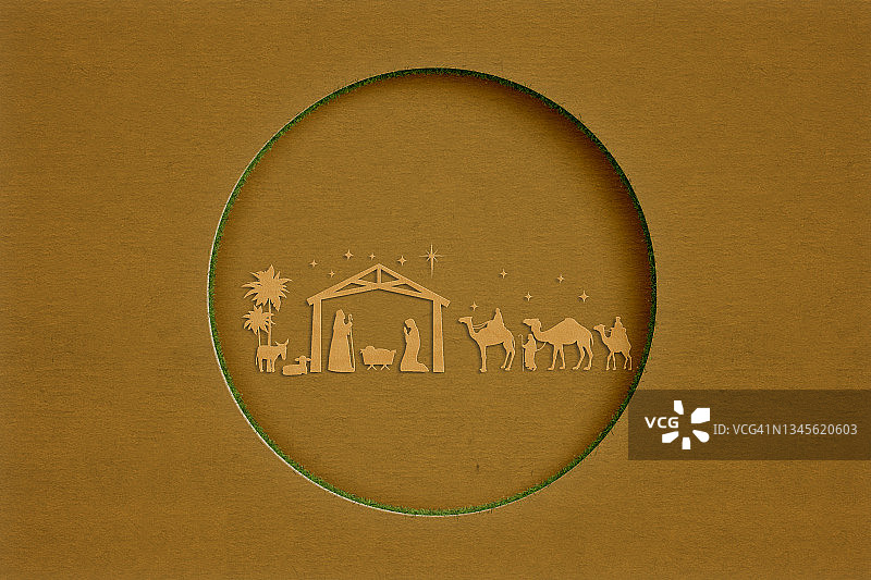 纸艺圣诞耶稣诞生场景与棕色背景图片素材