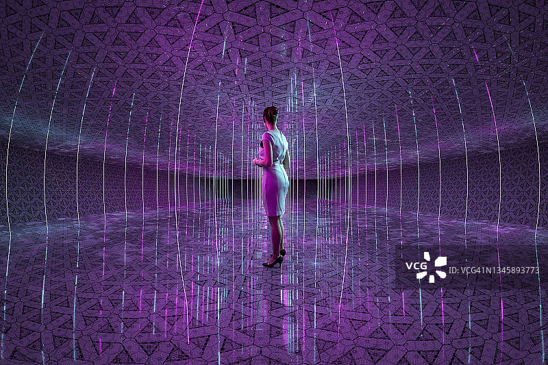 女商人站在未来感十足的走廊里图片素材