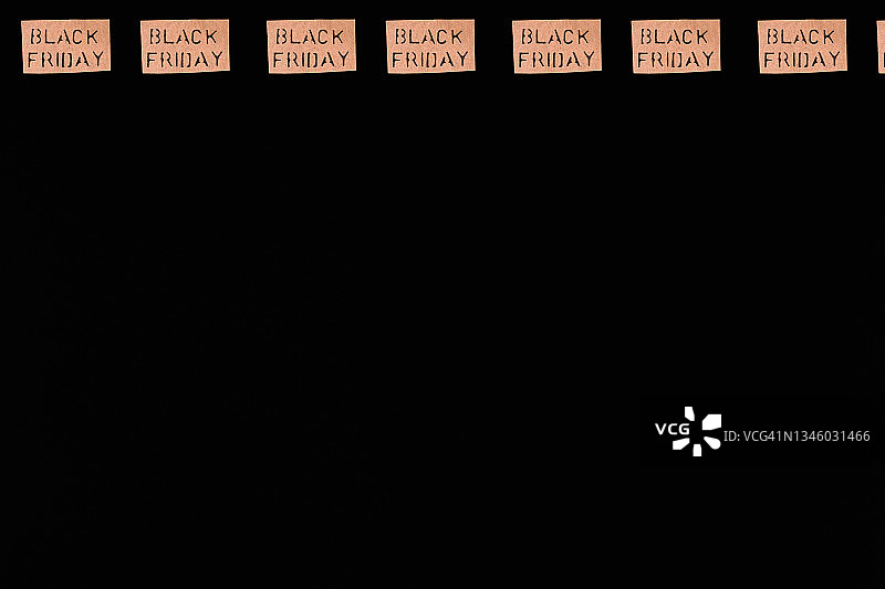 黑色背景上的“黑色星期五”棕色标志图案图片素材