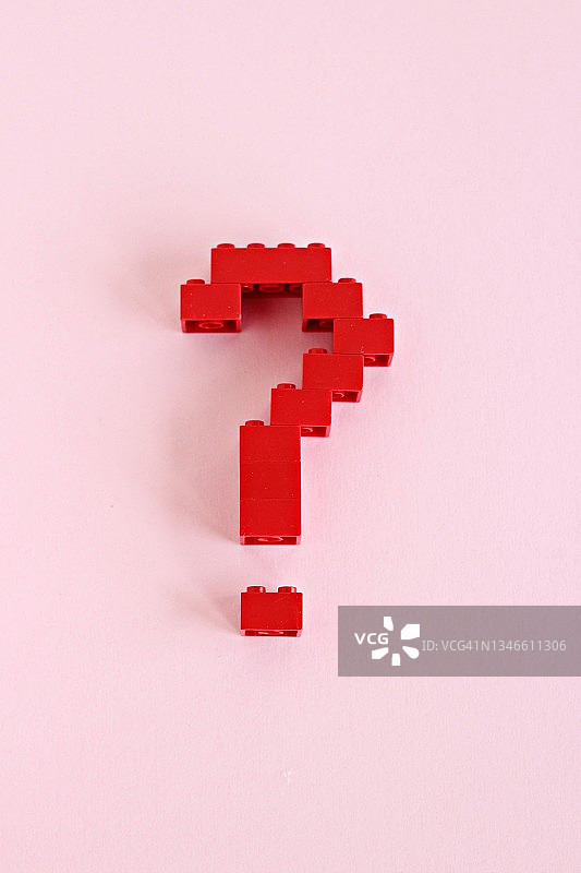 粉色背景上的问号图片素材