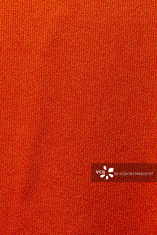 红色运动服装面料足球衫球衣纹理和纺织背景图片素材