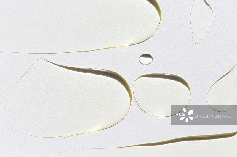 精油涂抹背景，身体护理美容概念，扁平风格微距摄影图片素材