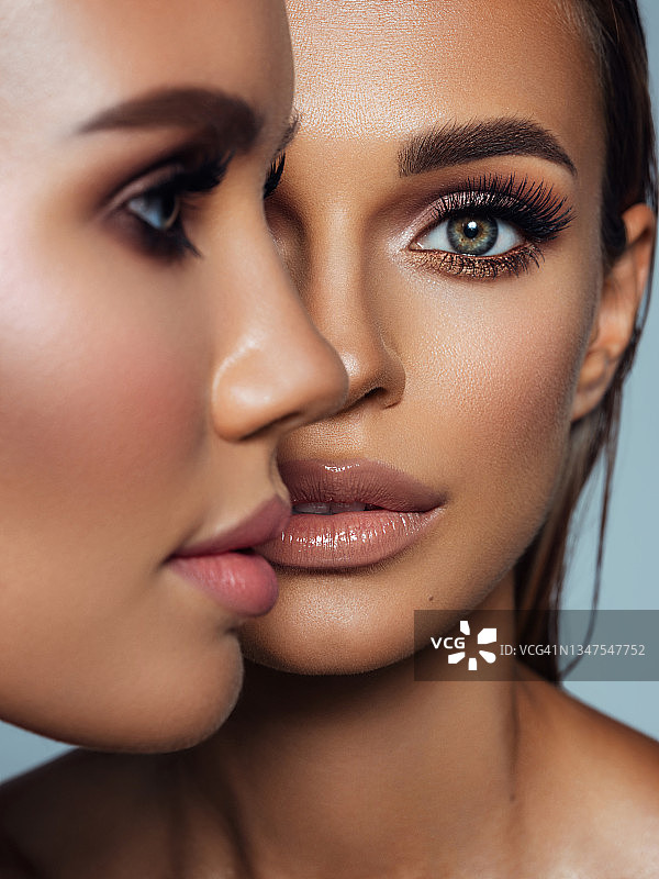 两位化着精致妆容的漂亮女性图片素材