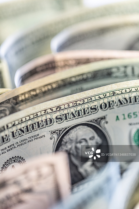 以美元纸币为背景的商业元素图片素材