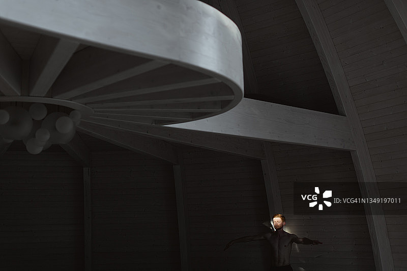 阳光下，年轻男子张开双臂图片素材