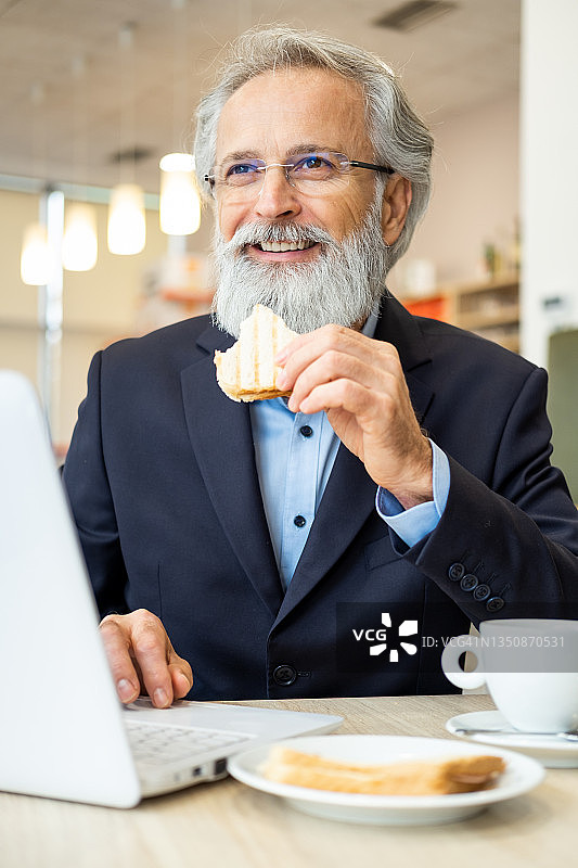 正在享用午餐的商人图片素材