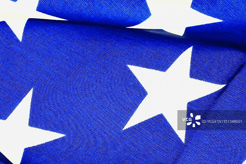 蓝色美国国旗上的白色星星图片素材