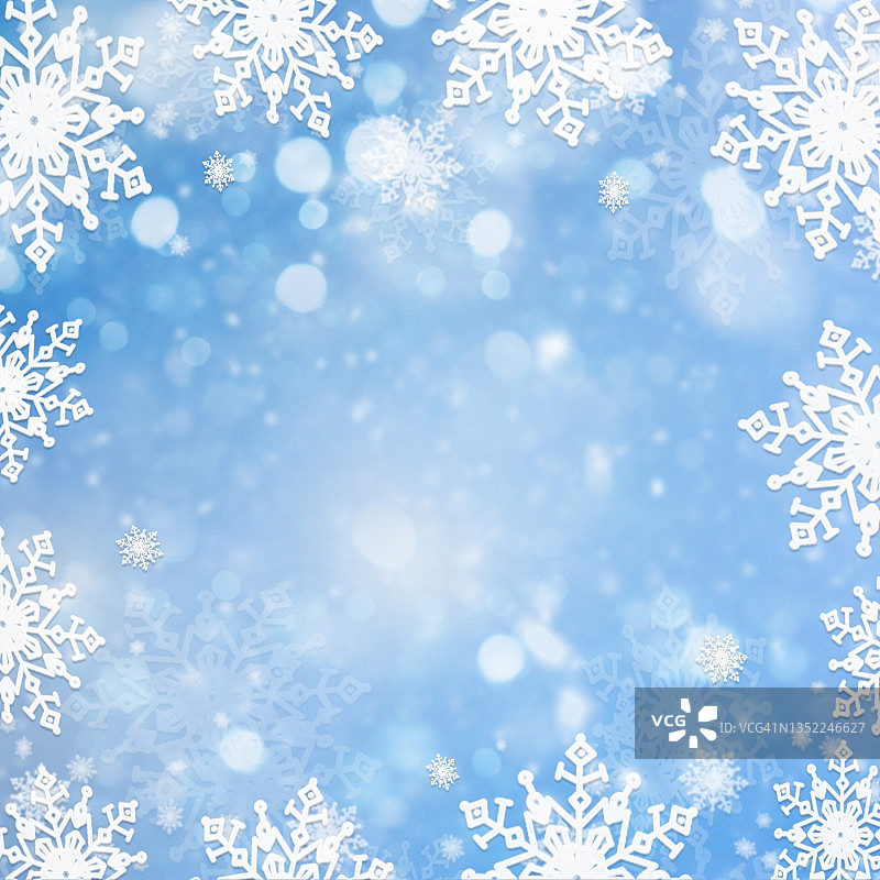 蓝色背景上的雪花图片素材