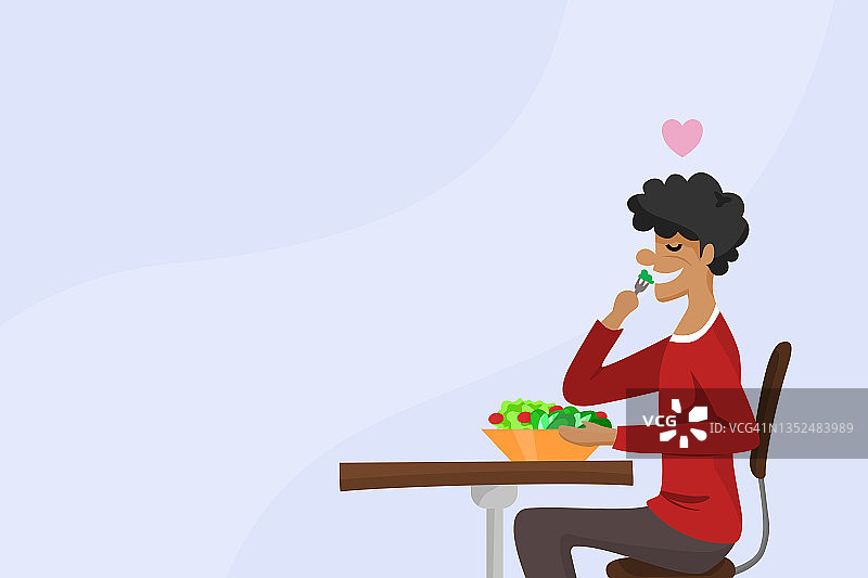 热爱蔬菜的男士在木桌上享用新鲜沙拉图片素材