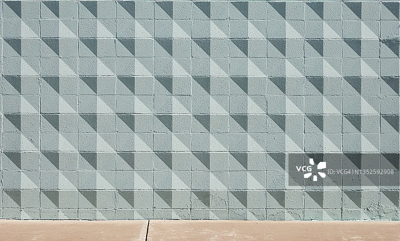 抽象背景：蓝色纹理墙面光影效果图片素材