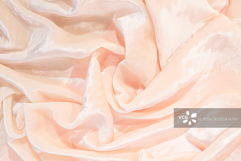 光滑优雅的金色天鹅绒或丝绸缎面奢华面料纹理背景图片素材