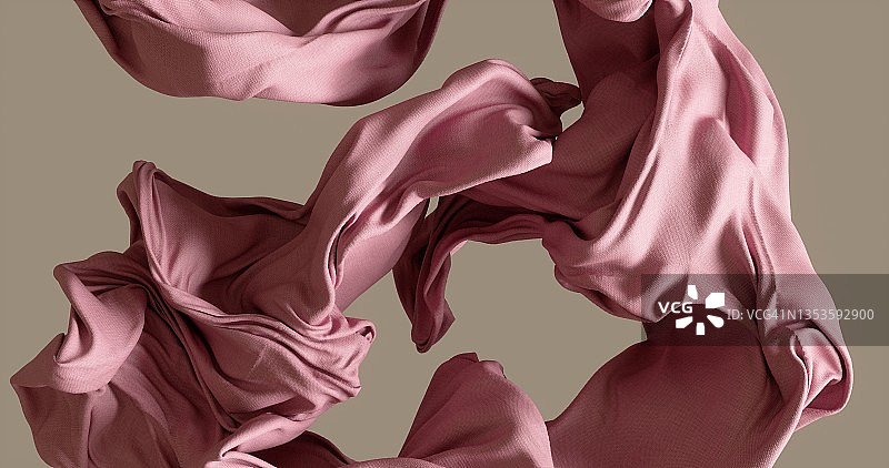 米色背景上随风飘动的棉布图片素材