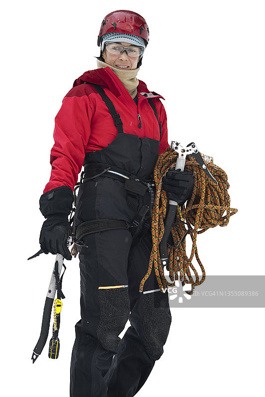 女人准备好冰攀，位于日本北海道大雪山国立公园层云峡图片素材